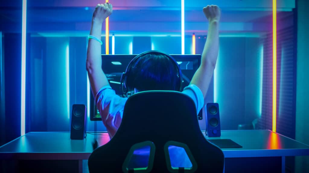 Professional Gamer Playing and Winning in Online Video Game