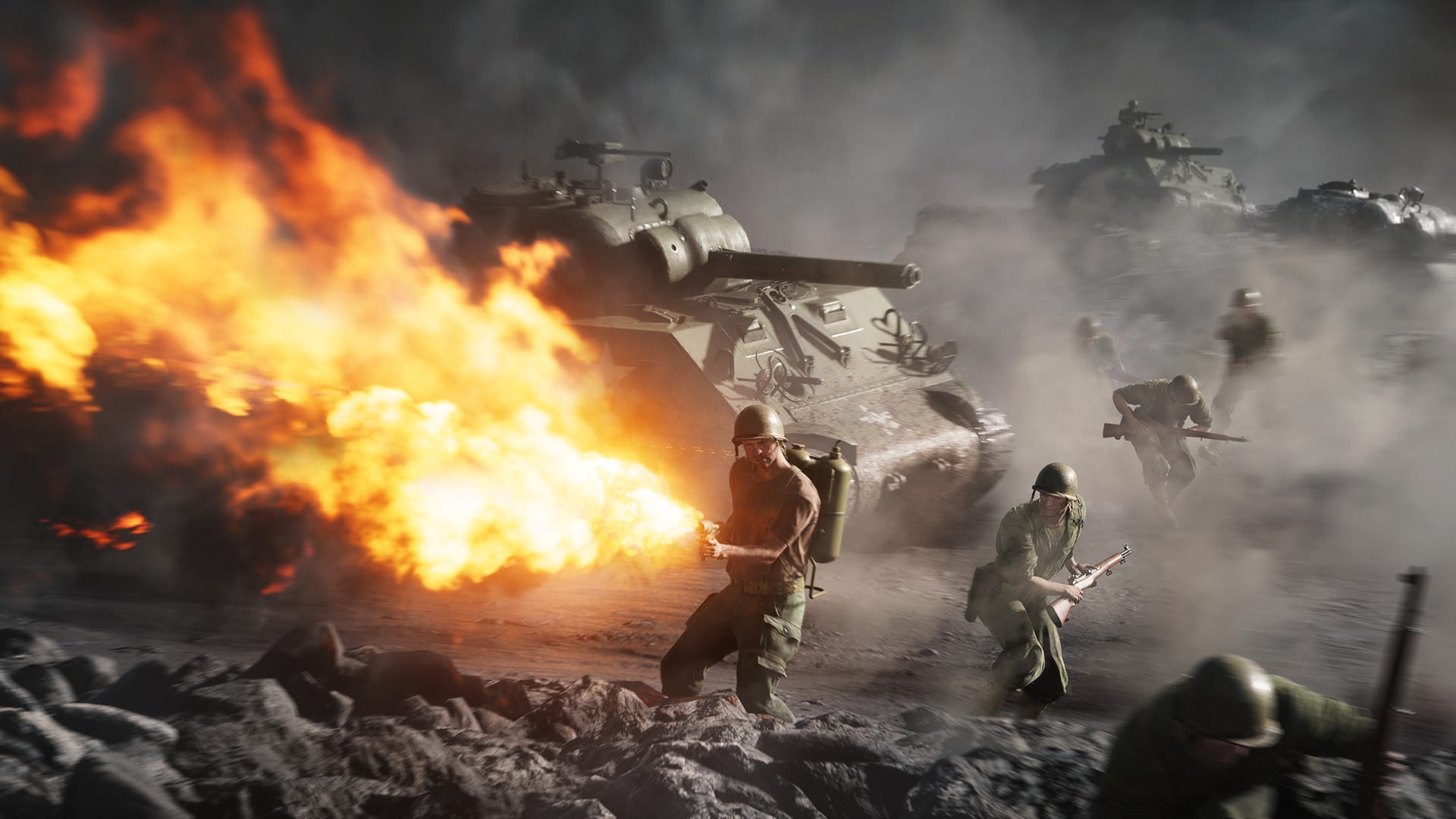 Eine Szene aus Battlefield 5, in der ein US-Soldat im Pazifikkrieg mit einem Flammenwerfer ins Bild feuert. Im Hintergrund sind US-Panzer und andere Soldaten zu sehen.